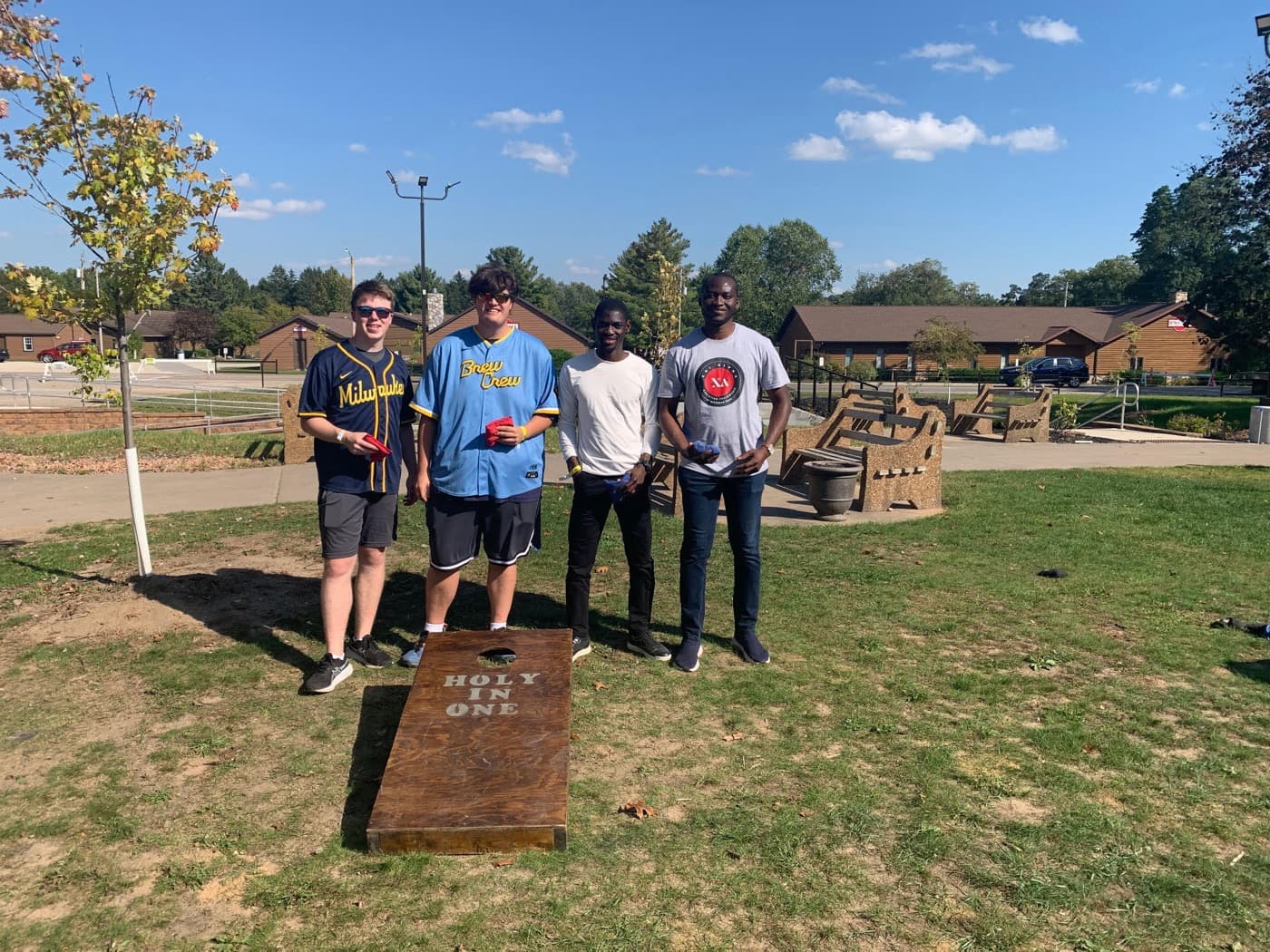 Group playing cornhole at retreat